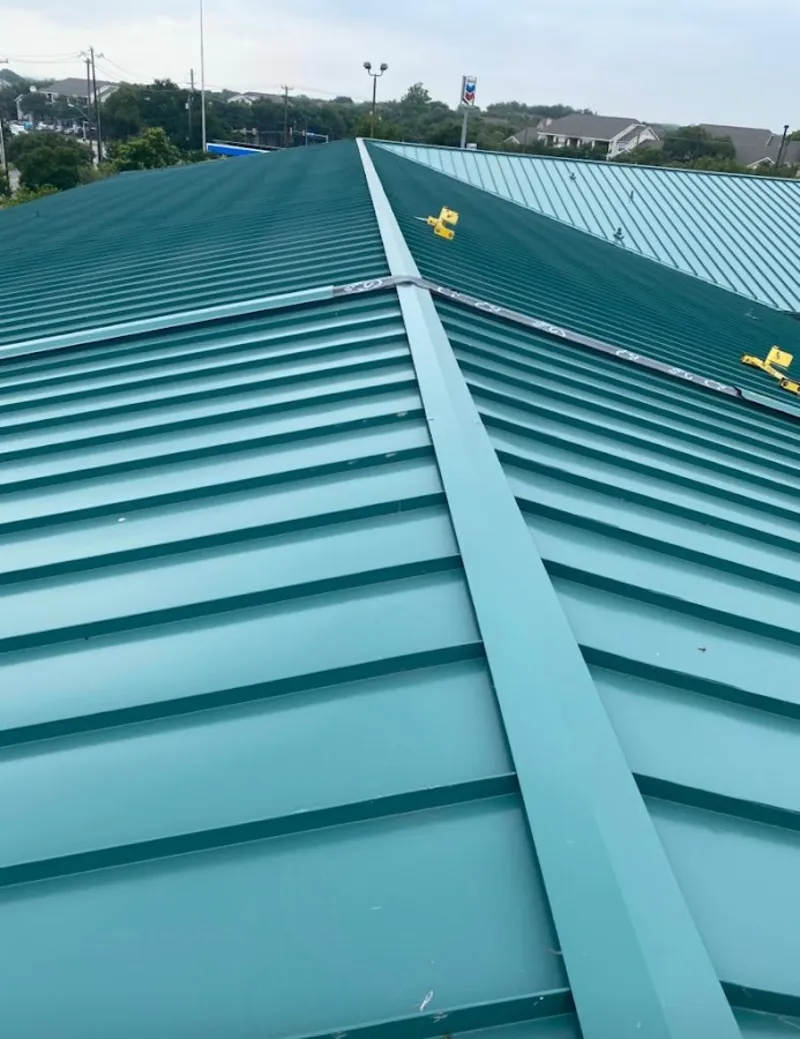Green commercial metal roof ridge and valley for Metal Roof Repair in Richland Hills