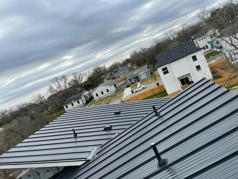 Standing seam metal roof panels with vents for Skylight Repair in Richland Hills